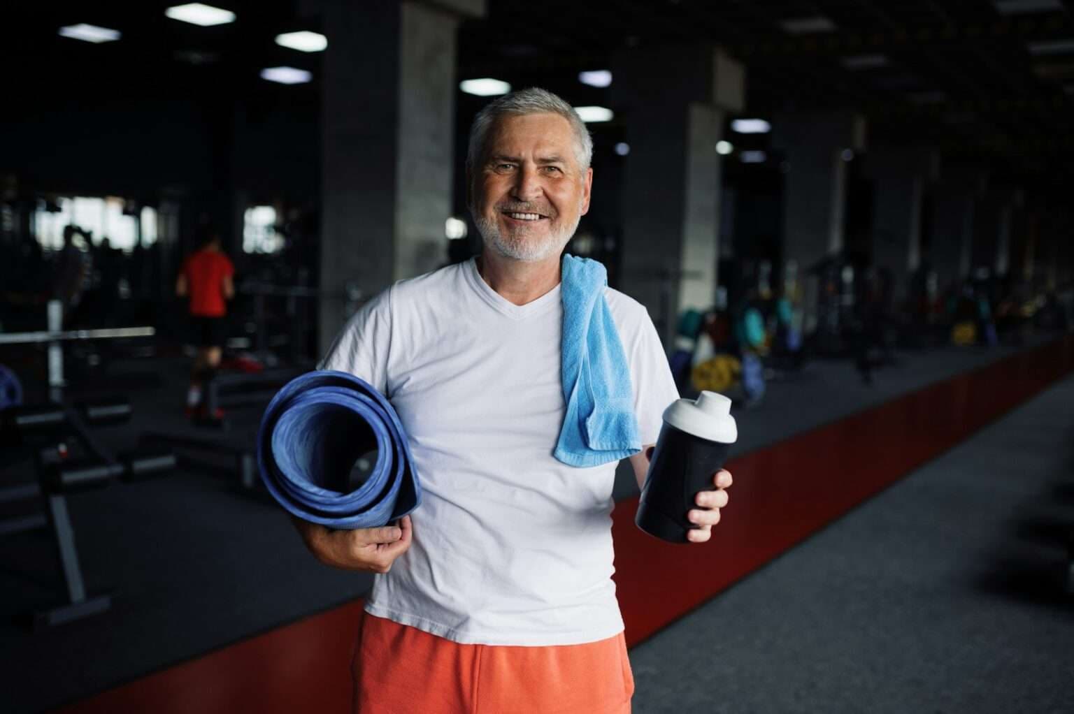 Energetic mature man at the gym after NAD+ IV therapy
