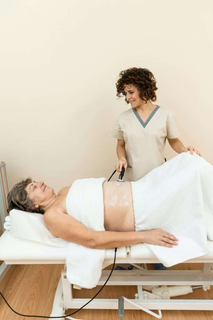 woman receiving treatment with radiofrequency machine for stimulation